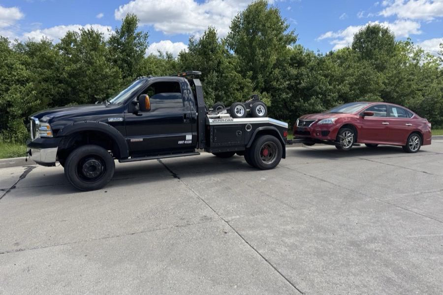ProLift tow truck loading a sedan in Cincinnati